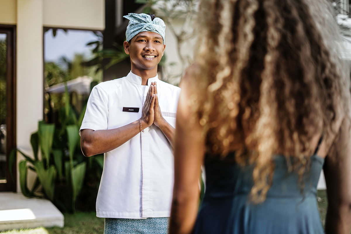 Villa Manager welcomes guest to Samana Villas, Legian